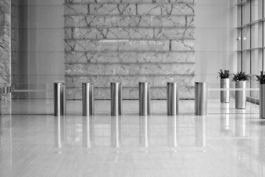Marble corporate lobby with steel entry barriers