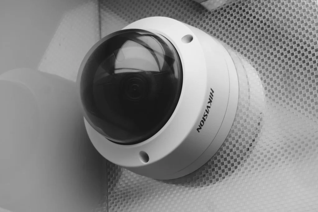Dome security camera mounted on a wall